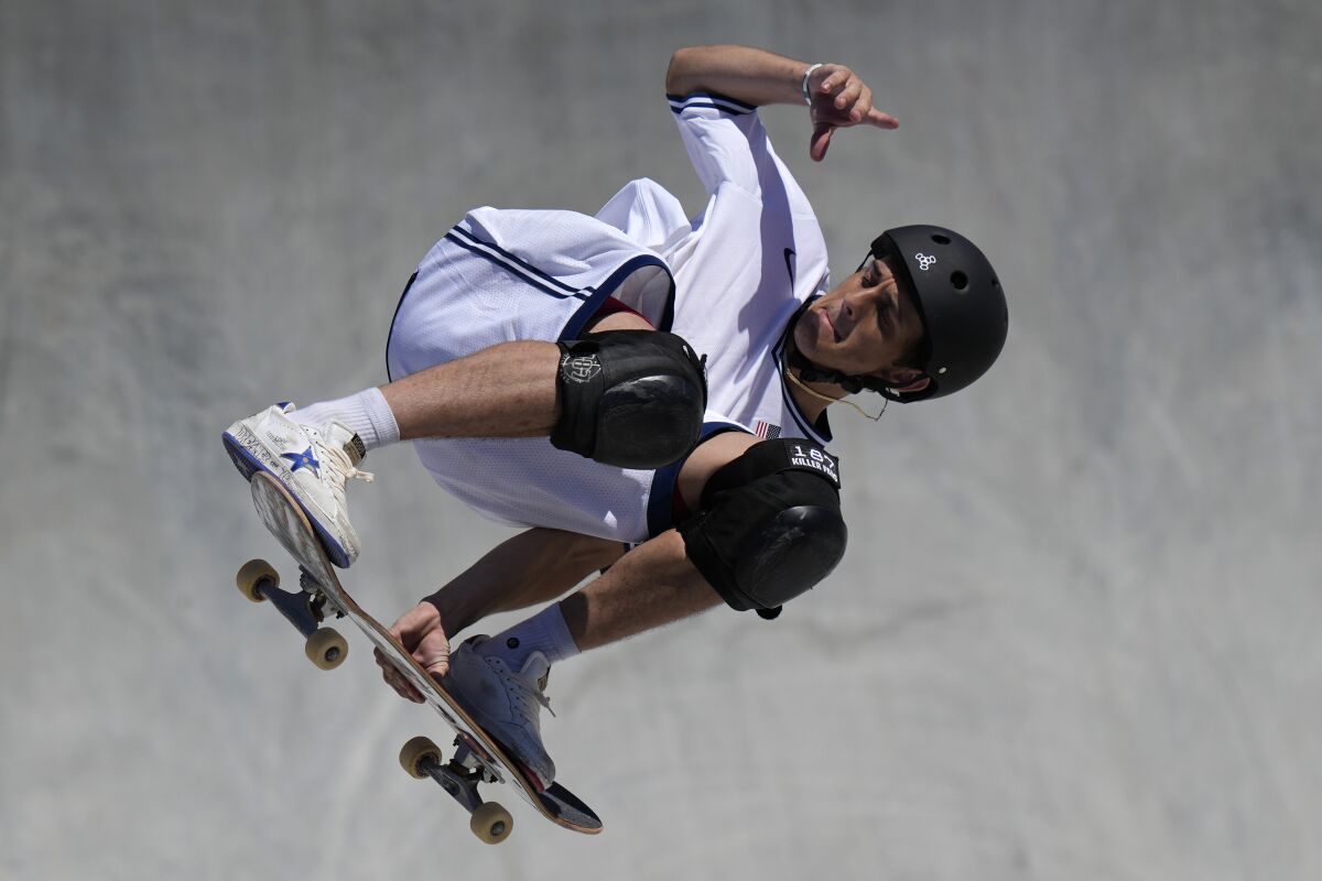 Cory Juneau of the United States competes in the men's skateboard park at the Tokyo Olympics.