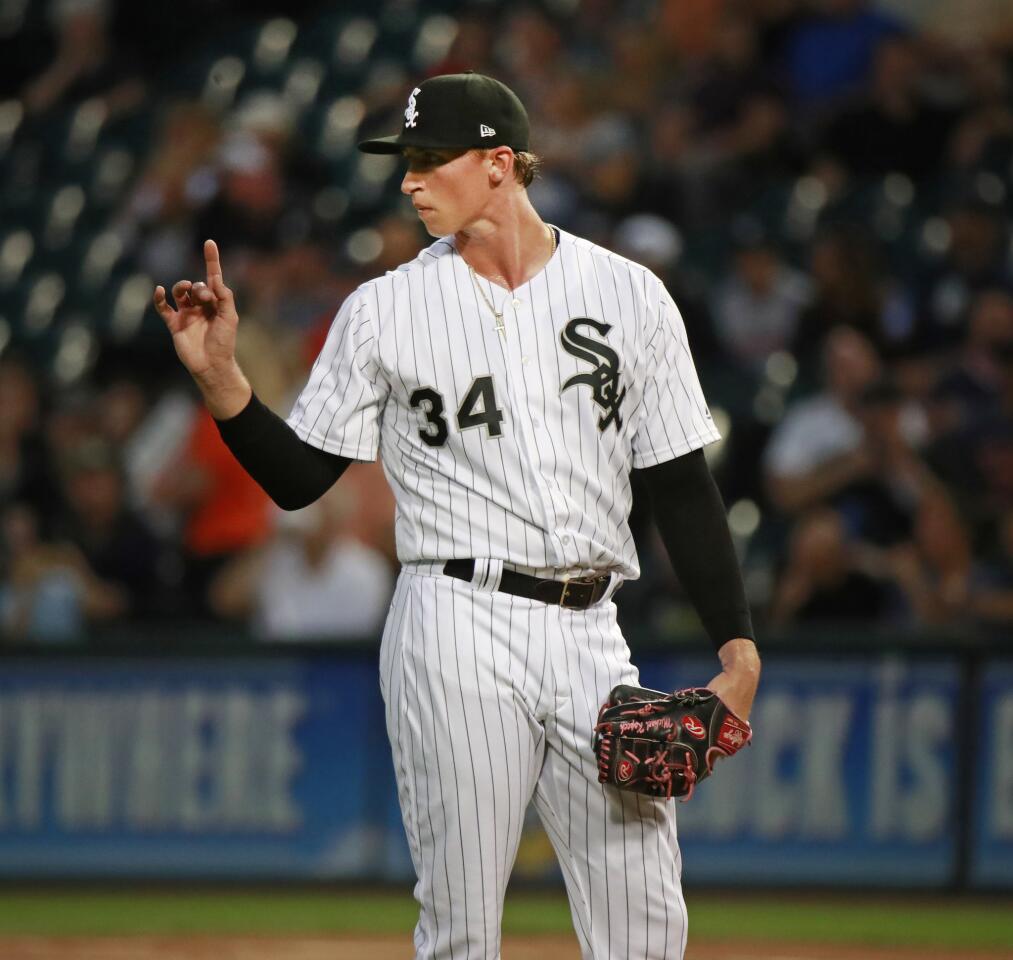 White Sox starting pitcher Michael Kopech signals one out in the first inning against the Tigers at Guaranteed Rate Field on Sept. 5, 2018.