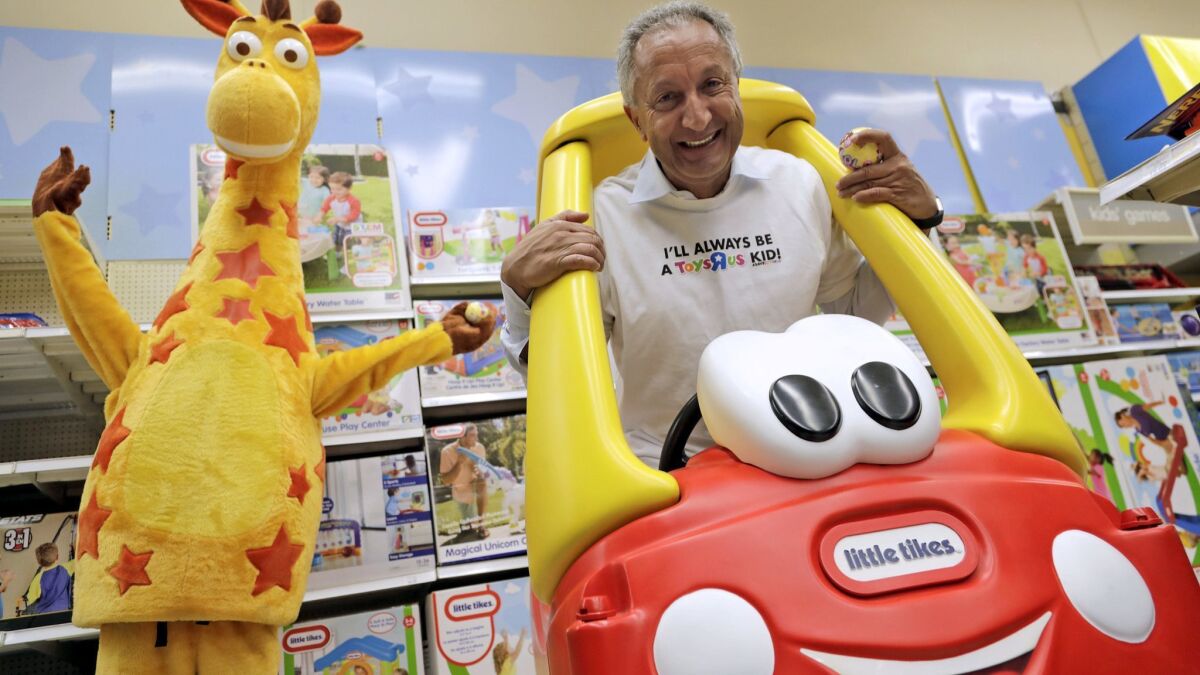 Isaac Larian, chief executive of MGA Entertainment, maker of the Little Tikes brand, made a $675-million bid Friday to save 274 U.S. Toys R Us stores. Above, Larian at one of the retailer's stores in Woodland Hills last month to film a video for a GoFundMe campaign.