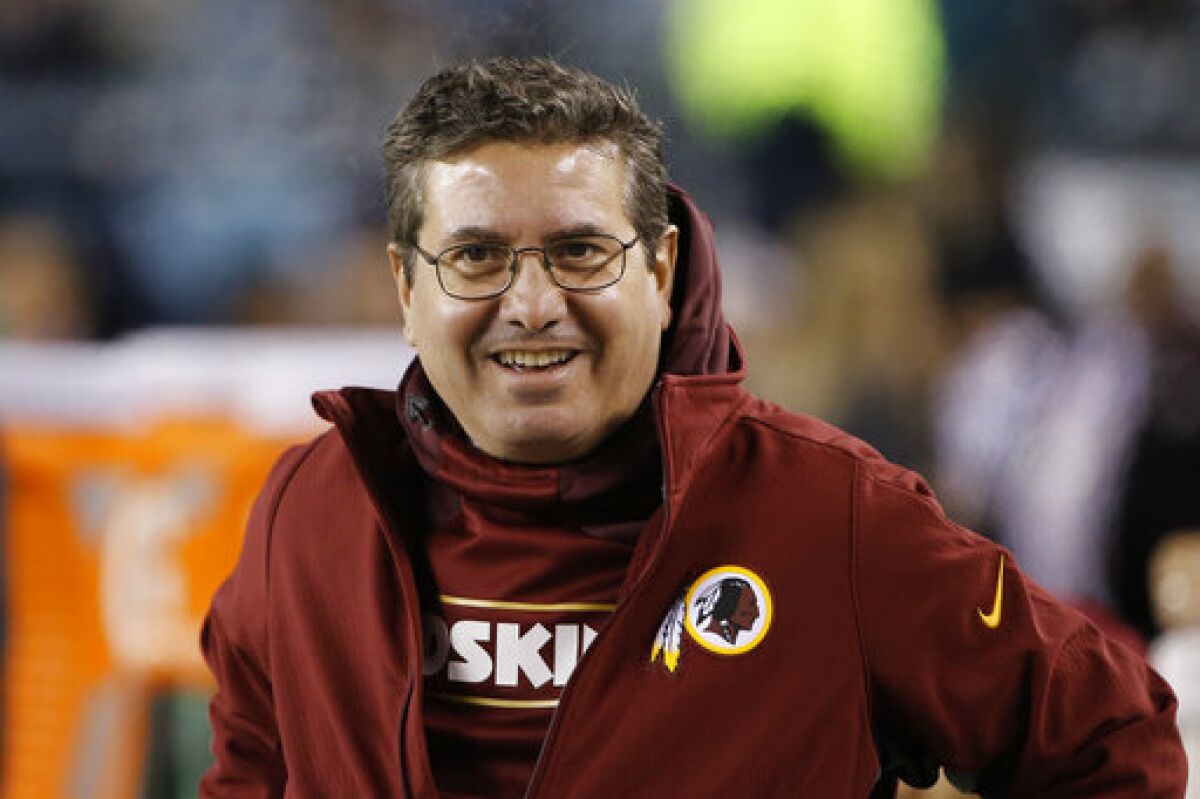 FILE - In this Dec. 26, 2015, file photo, Washington Redskins owner Daniel Snyder walks the sidelines during an NFL football game against the Philadelphia Eagles, in Philadelphia. A new name must still be selected for the Washington Redskins football team, one of the oldest and most storied teams in the National Football League, and it was unclear how soon that will happen. But for now, arguably the most polarizing name in North American professional sports is gone at a time of reckoning over racial injustice, iconography and racism in the U.S. (AP Photo/Matt Rourke, File)