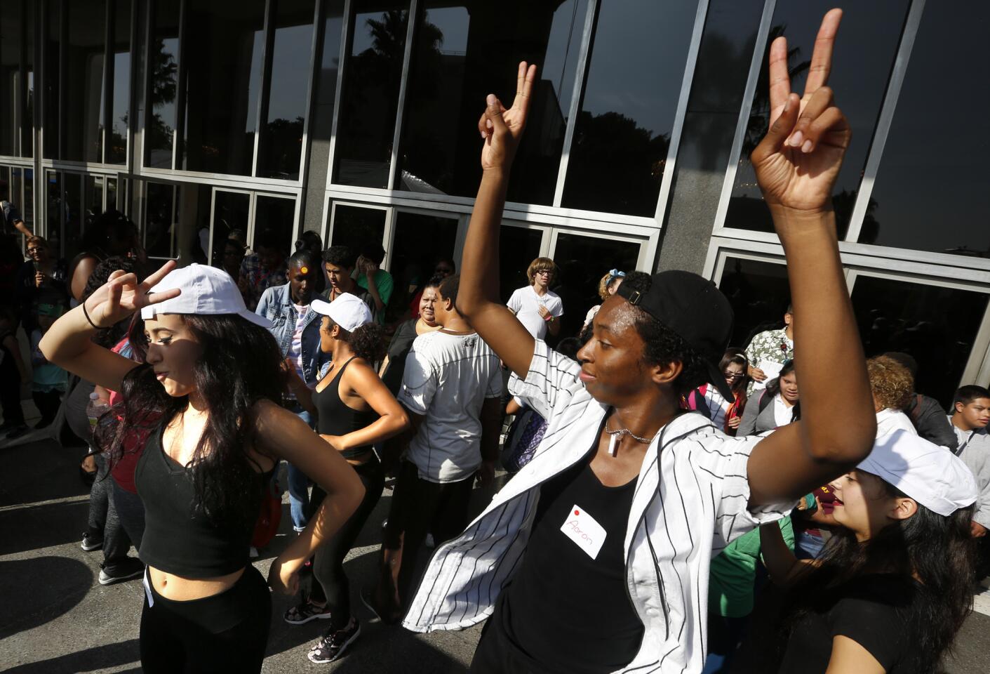 Los Angeles High School For the Art student Aaron Stokes (right) and his fellow students teach dance moves at the "disco" during the 37th Annual Very Special Arts Festival at the Music Center