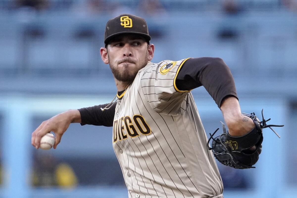 San Diego Padres starting pitcher Joe Musgrove throws to the plate during the first inning.