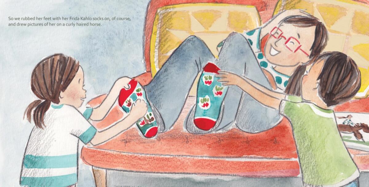 Book author Phyllis Schwartz owns Frida Kahlo socks like those pictured in her book, "When Mom Feels Great, Then We Do Too!"