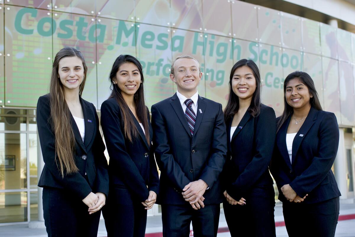 Costa Mesa High School seniors, from left, Catherine Kricorian, Jeirany Chavez, Matthew Brown, Sophie Nguyen and Zaira Lopez, representing the Business Academy's business plan team, created a make-believe company called Go-Tect, which placed second in a statewide competition last December. The team is headed to New York City, in April, for the national competition.