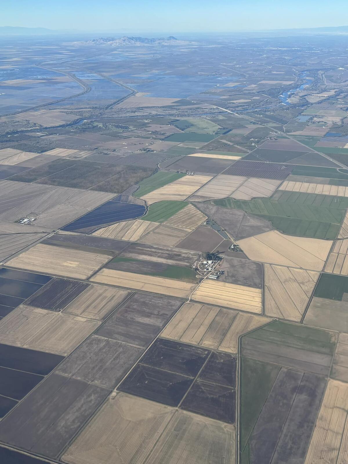 Aerial view of Sacramento Valley between Sutter Buttes and Sacramento.