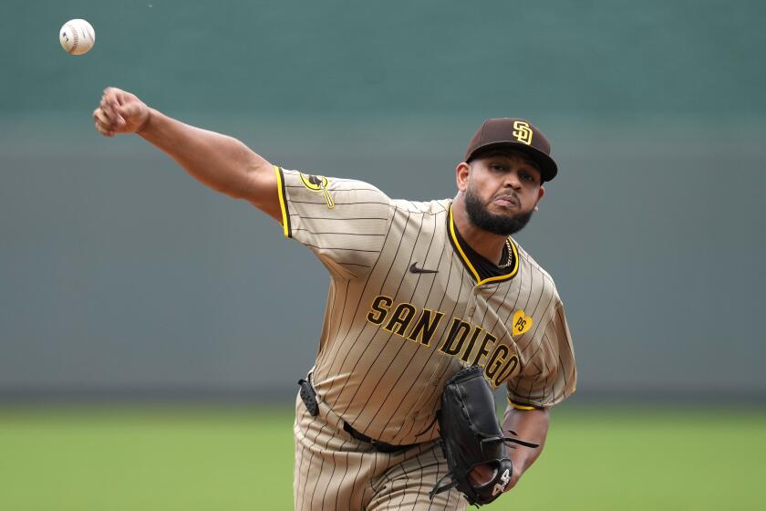 San Diego Padres starting pitcher Randy Vasquez throws during the first inning of a baseball game against the Kansas City Royals Saturday, June 1, 2024, in Kansas City, Mo. (AP Photo/Charlie Riedel)