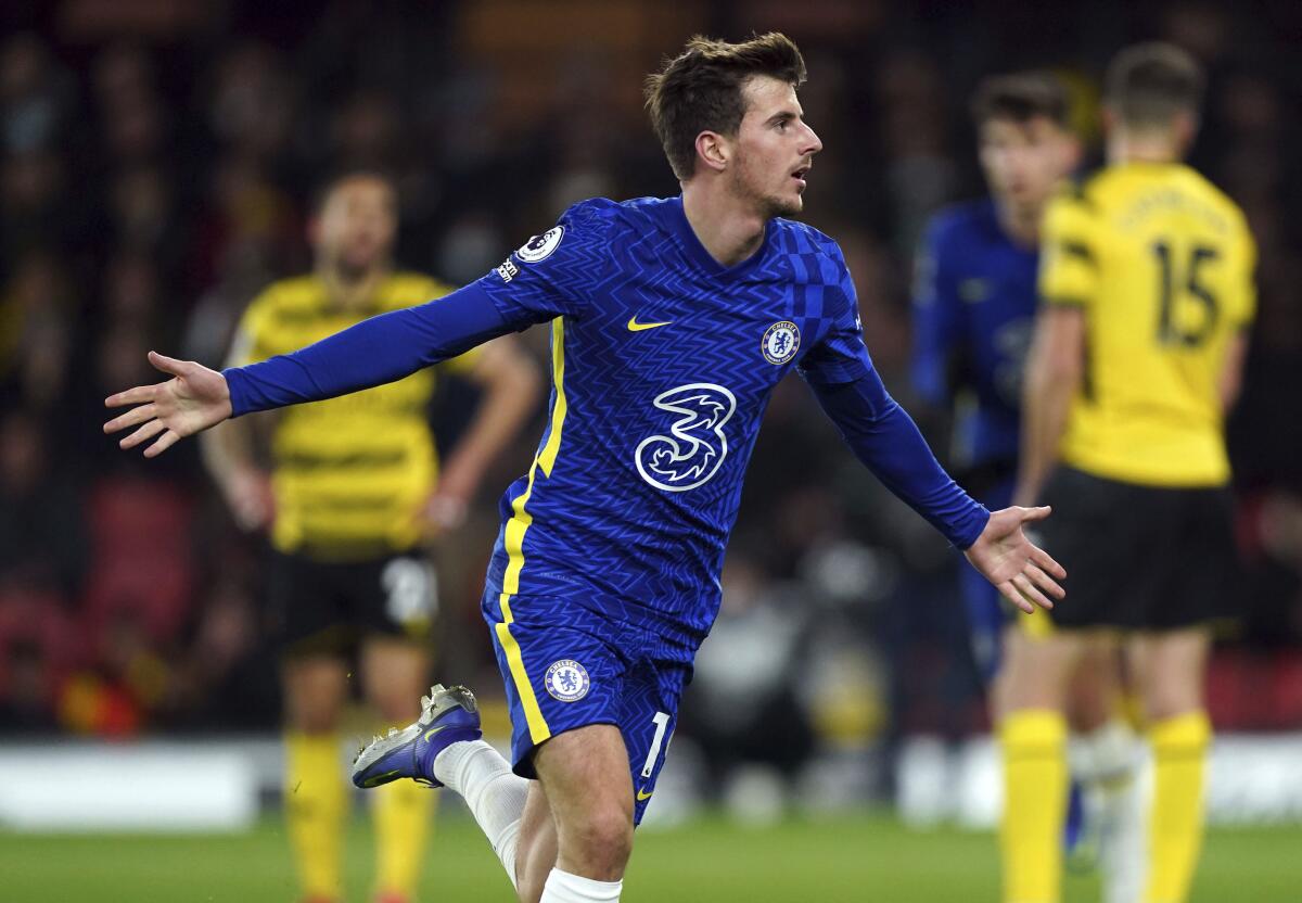 Chelsea's Mason Mount celebrates scoring during the English Premier League soccer match between Watford and Chelsea at Vicarage Road, Watford, England, Wednesday Dec. 1, 2021. (Mike Egerton/PA via AP)