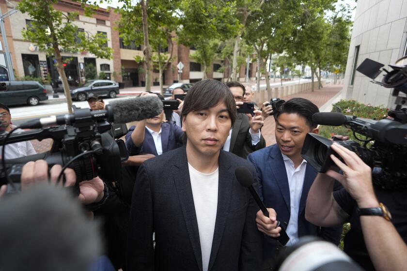 Ippei Mizuhara, the former interpreter for the Los Angeles Dodgers baseball star Shohei Ohtani, arrives at federal court in Los Angeles, Tuesday, June 4, 2024. Mizuhara is scheduled to plead guilty Tuesday to bank and tax fraud in a sports betting case where he is expected to admit to stealing nearly $17 million from the Japanese baseball player. (AP Photo/Damian Dovarganes)