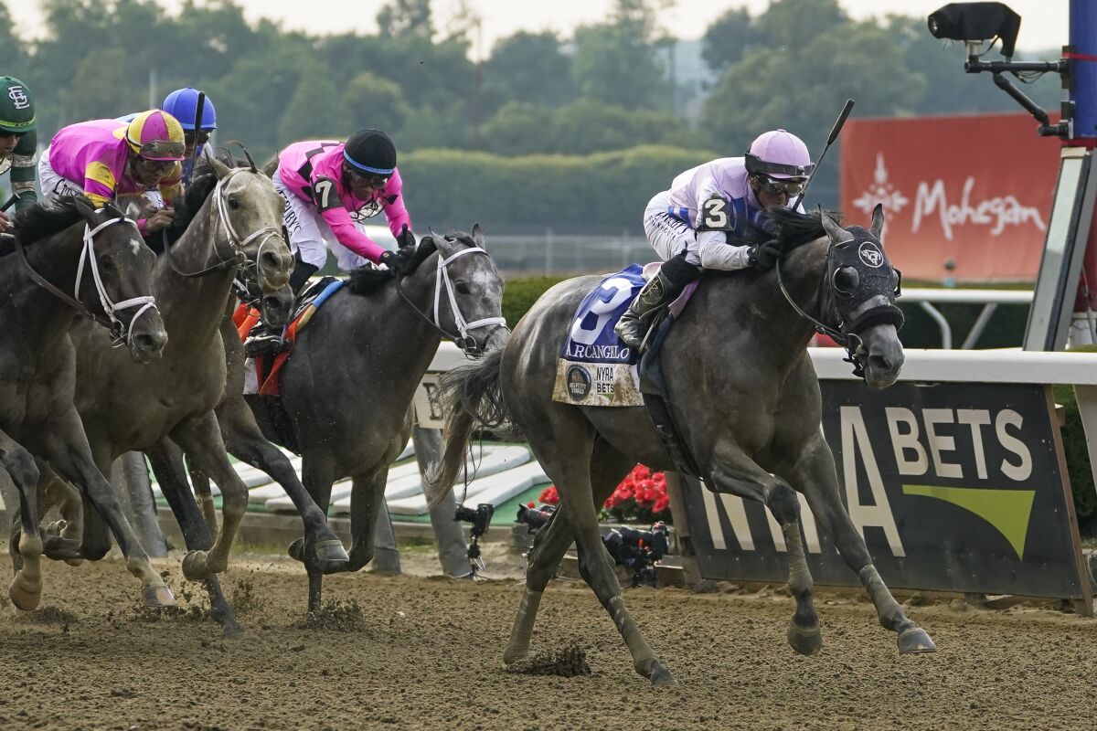 Arcangelo, with jockey Javier Castellano riding, crosses the finish line to win the Belmont Stakes on Saturday.