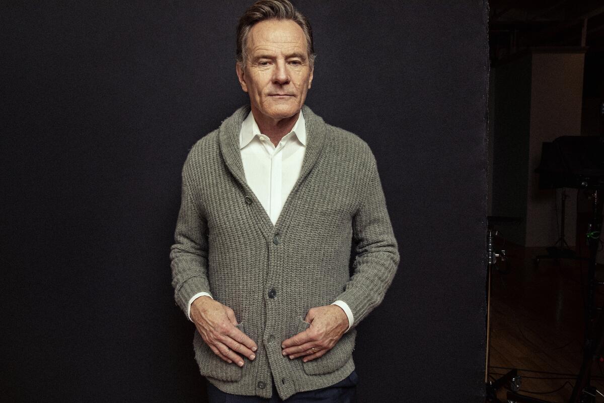 man in a sweater and button down