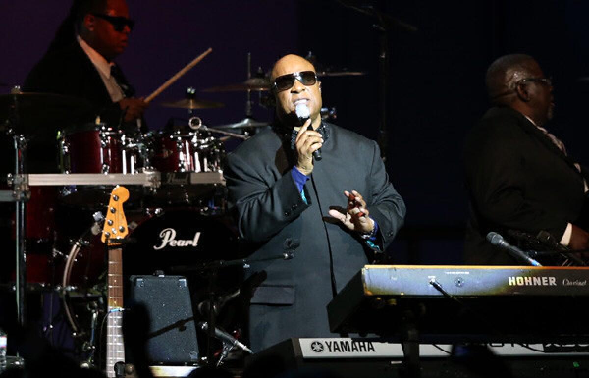 Stevie Wonder performs Monday night during President Obama's inaugural ball at the Walter E. Washington Convention Center.