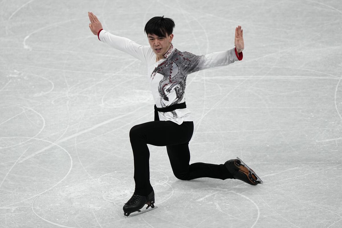 American Vincent Zhou competes in the men's team free skate program 