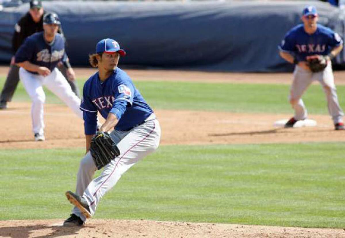 Yu Darvish delivers a pitch during the second inning.
