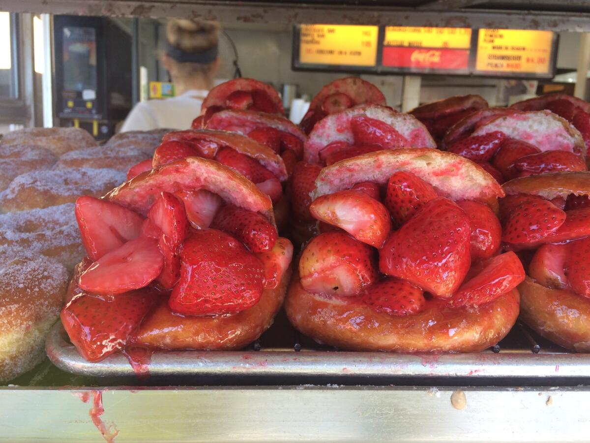 The fresh strawberry donuts at the legendary Donut Man on Route 66 in Glendora.