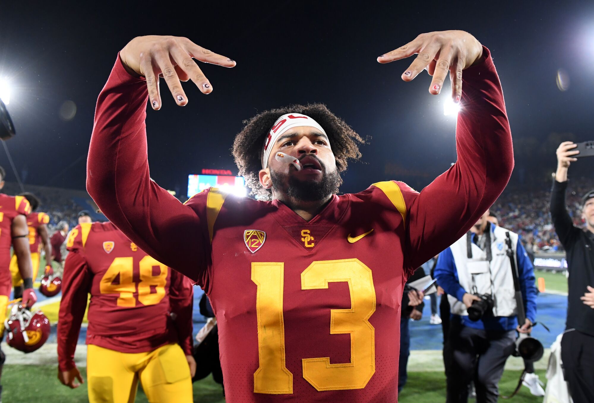 USC quarterback Caleb Williams celebrates after the Trojans' 48-45 victory over UCLA at the Rose Bowl.