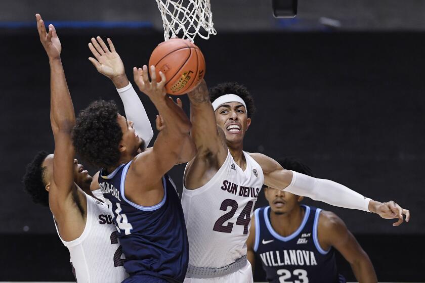 Arizona State's Jalen Graham (24), blocks a shot attempt by Villanova's Jeremiah Robinson-Earl during the first half of an NCAA college basketball game Thursday, Nov. 26, 2020, in Uncasville, Conn. (AP Photo/Jessica Hill)