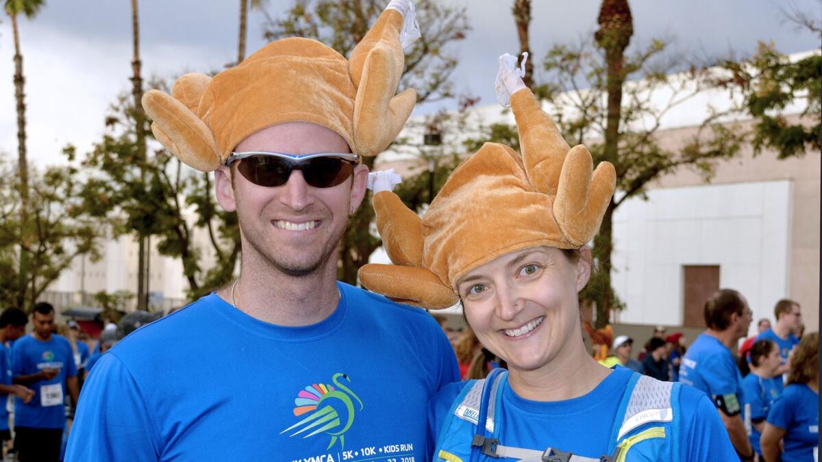 Dan Cole and his wife Talia Gibas celebrated their second wedding anniversary by running in this year's Turkey Trot. "We've done this four time and there's actually three of us running this year," Gibas said as she revealed the couple will be having a baby in 2019.