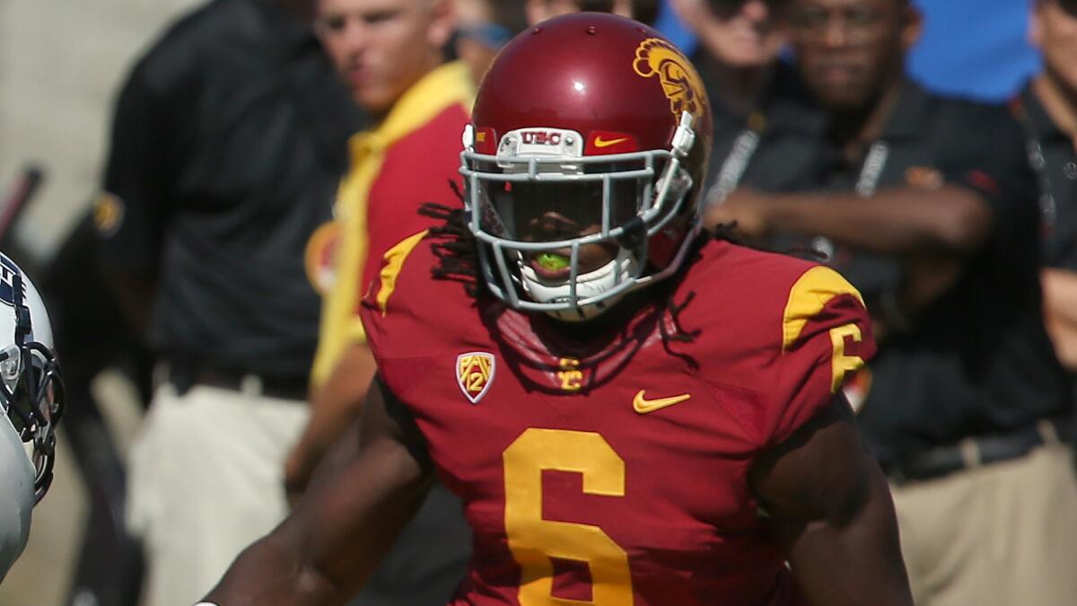 USC defensive back Josh Shaw runs on the field during a game against Utah State in 2013.