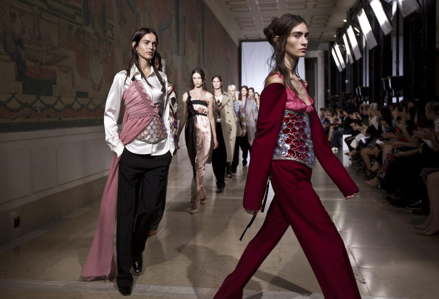 Tailored suit pieces and elegant silk slips are featured during Maison Martin Margiela's show at spring/summer Paris Fashion Week.