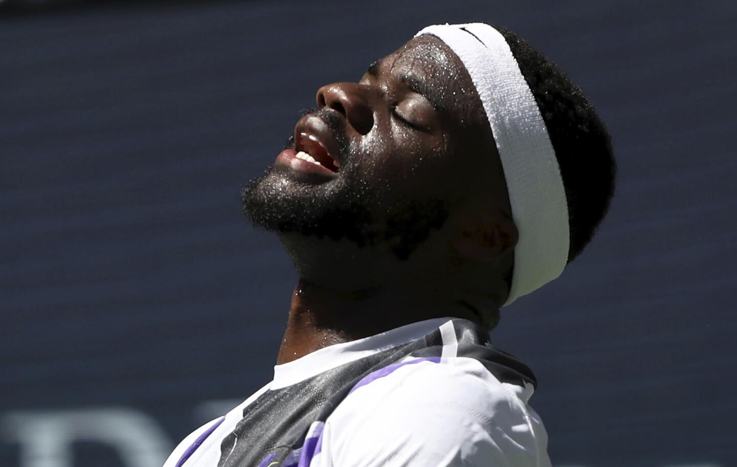Frances Tiafoe reacts after losing a point to Alexander Zverev during the second round match on Day 4 of the 2019 U.S. Open at the USTA Billie Jean King National Tennis Center on Aug.29, 2019, in Queens.