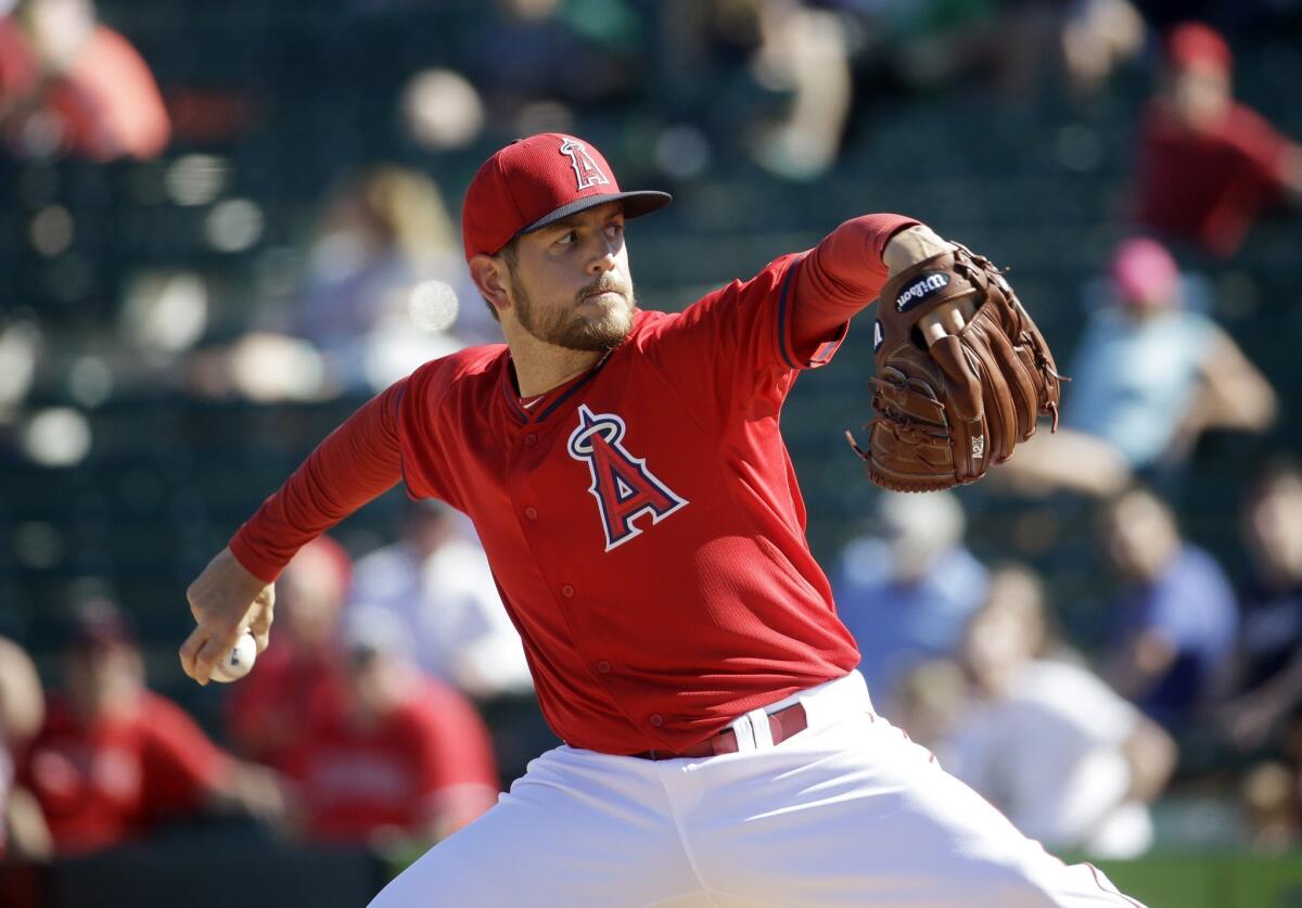 Angels pitcher Cory Rasmus delivers against the Brewers during an exhibition game on March 5.