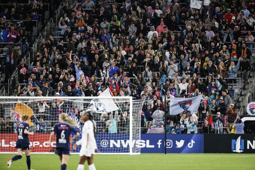 San Diego, CA - March 25: Fans cheer on the San Diego Wave during the season opener against the Chicago Red Stars at Snapdragon Stadium on Saturday, March 25, 2023 in San Diego, CA. Saturday's game's attendance was 30,854, setting an NWSL opening day record. (Meg McLaughlin / The San Diego Union-Tribune)