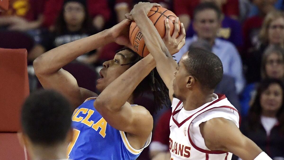 UCLA center Moses Brown has a shot blocked by USC guard Shaqquan Aaron on Jan. 19. Brown has been a non-factor during the Bruins’ current two-game losing streak.