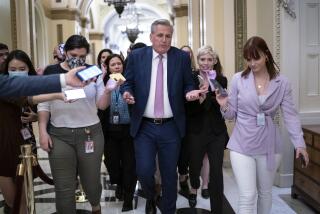 FILE - House Republican Leader Kevin McCarthy, R-Calif., rushes to his office with reporters in pursuit, at the Capitol in Washington, Thursday, May 12, 2022. Two months after his historic ouster as House speaker, Republican Rep. Kevin McCarthy of California announced on Wednesday, Dec. 6, 2023, that he is resigning from his congressional seat and will leave by the end of the year. (AP Photo/J. Scott Applewhite, File)