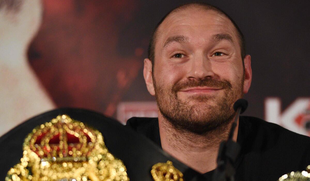 British heavyweight boxer Tyson Fury, seen here before his career unraveled, said Wednesday that he is vacating his heavyweight titles so he can focus on recovery from his drug problems.