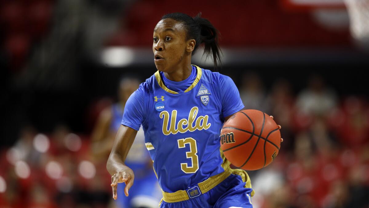 UCLA guard Kiara Jefferson drives in the first half against Maryland.