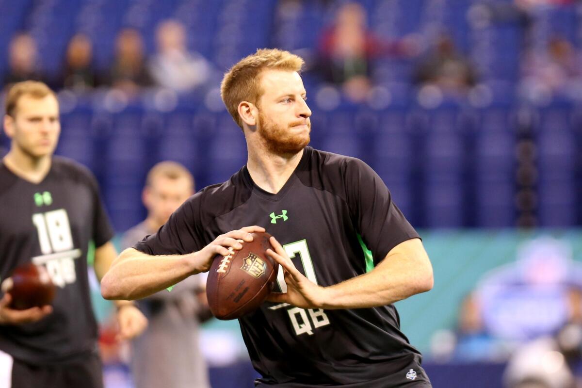 North Dakota State quarterback Carson Wentz performs a drill at the NFL scouting combine in Indianapolis on Feb. 27.