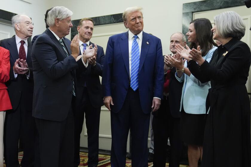 Republican presidential candidate former President Donald Trump arrives to speak with reporters at the National Republican Senatorial Committee, Thursday, June 13, 2024, in Washington. (AP Photo/Evan Vucci)