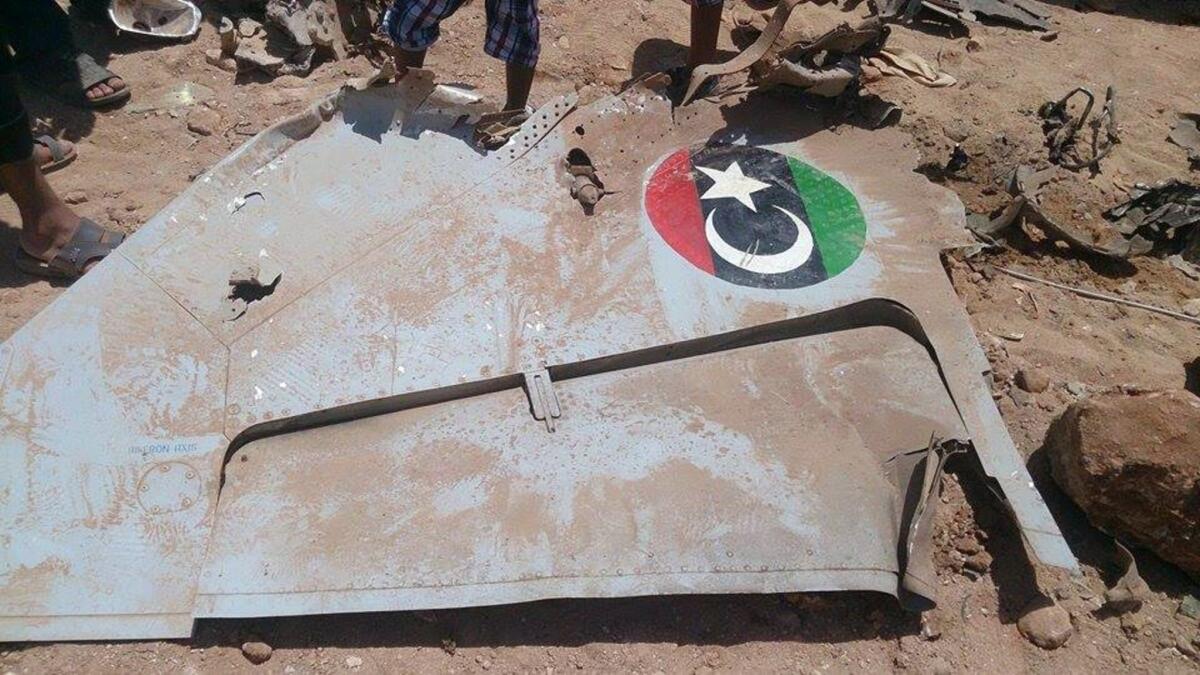 Wreckage from a Libyan paramilitary fighter lies on the ground after it crashed in the eastern city of Benghazi during fighting with Islamist groups on July 29.