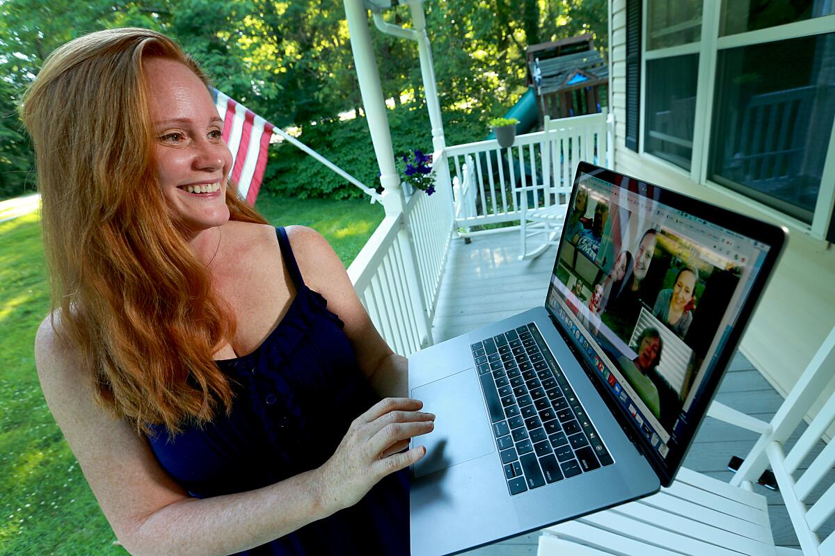 Wendy Bohon, 44, talks with her family in southern Virginia over Zoom.