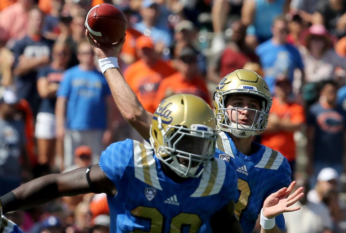 UCLA quarterback Josh Rosen throws downfield against Virginia in the second half Saturday.