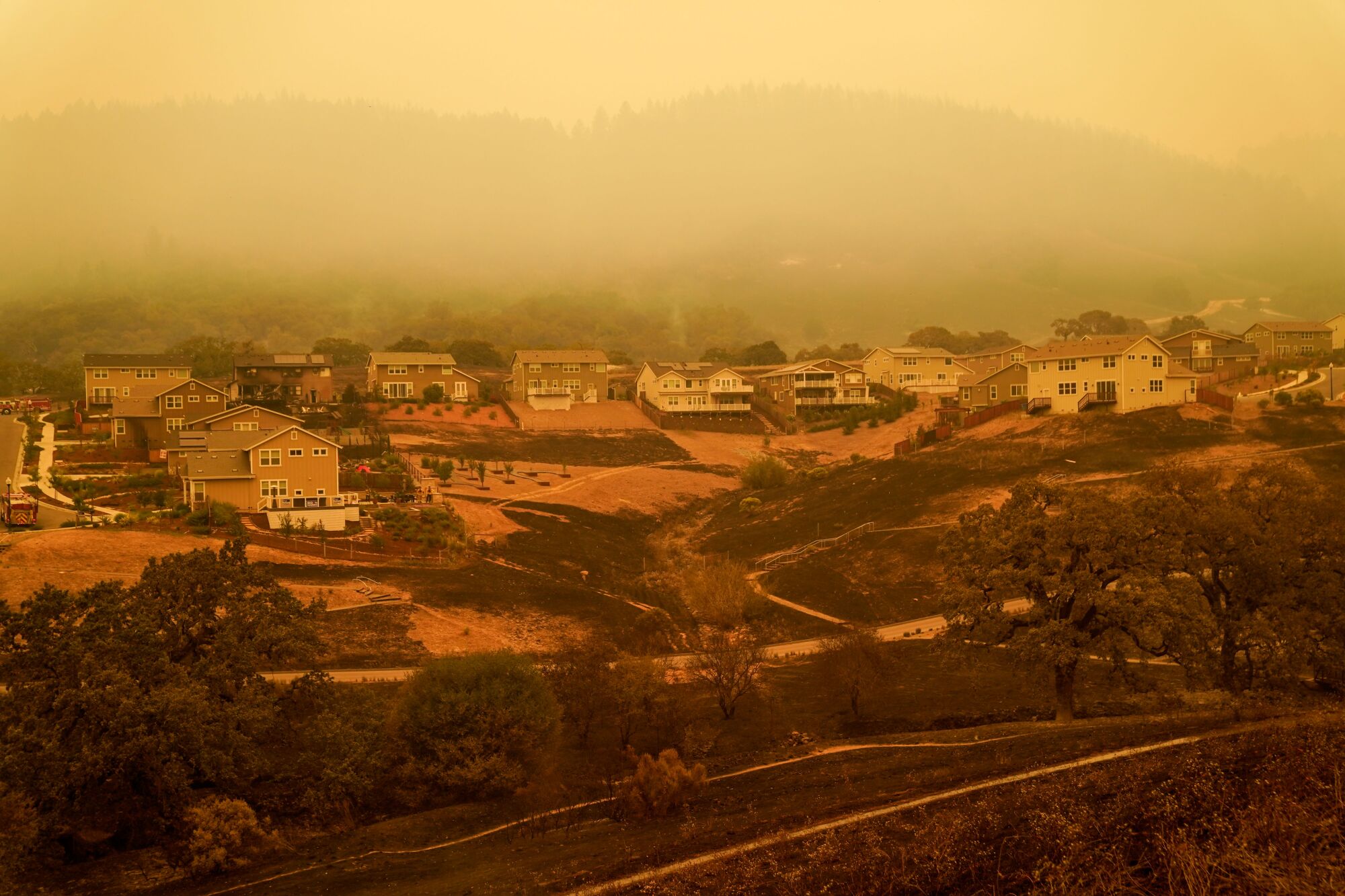 A deep layer of smoke covers a Santa Rosa community.