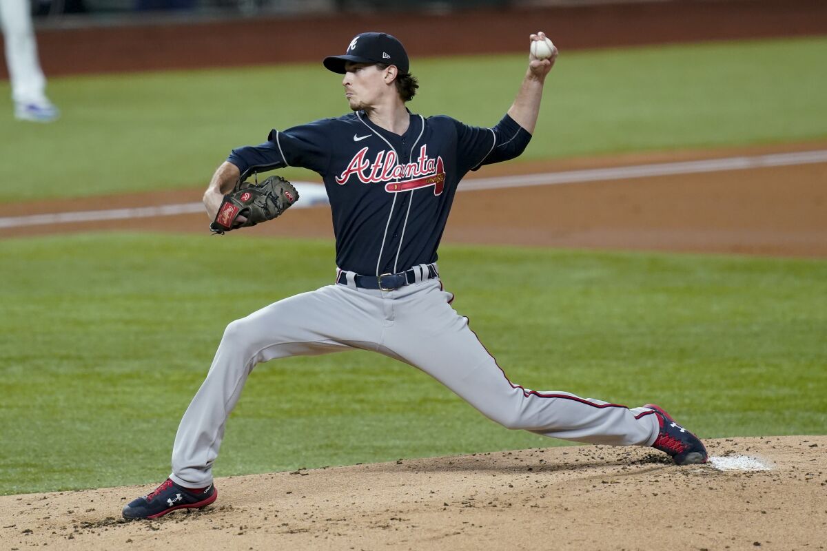 Atlanta Braves starting pitcher Max Fried throws against the Dodgers in the first inning.