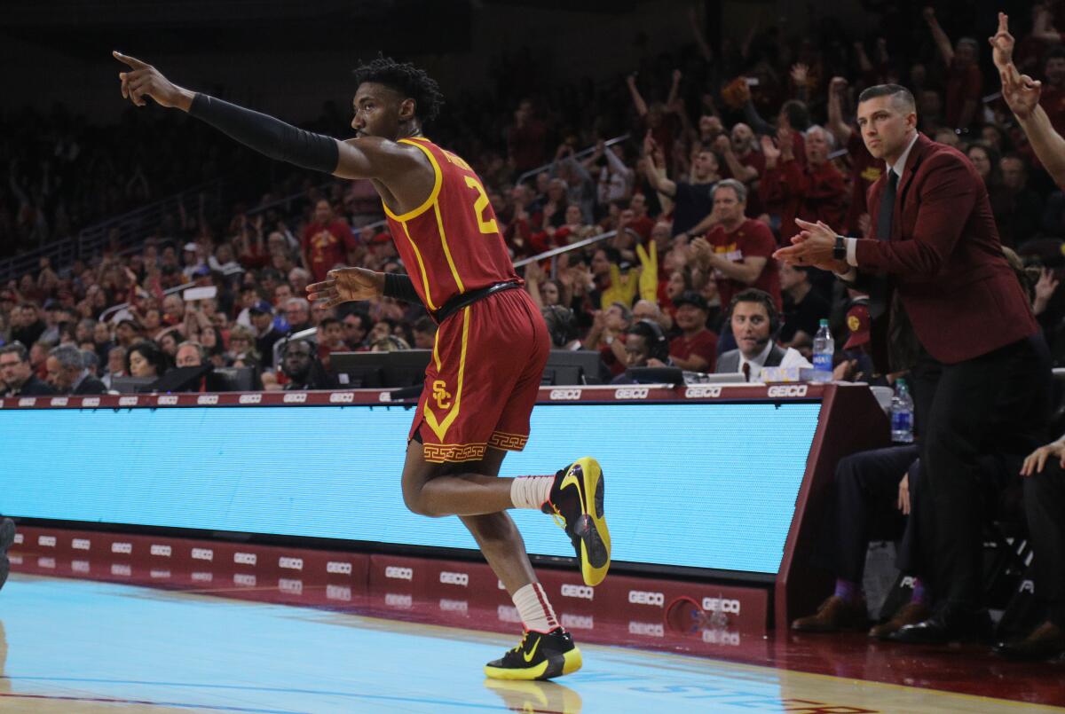 USC guard Jonah Mathews reacts after scoring one of his five three-pointers including the game-winner in the second half against UCLA at Galen Center on March 7.