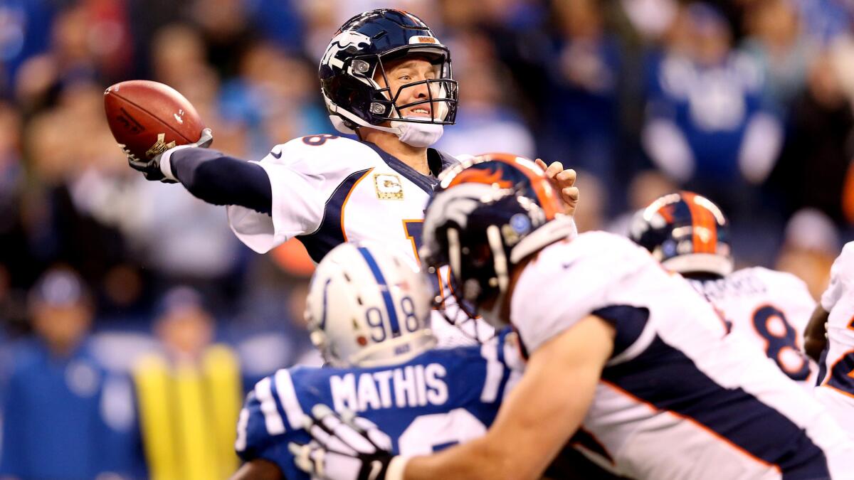Broncos quarterback Peyton Manning lost in his return to Indianapolis, falling three yards shy of Brett Favre's all-time yards passing record.