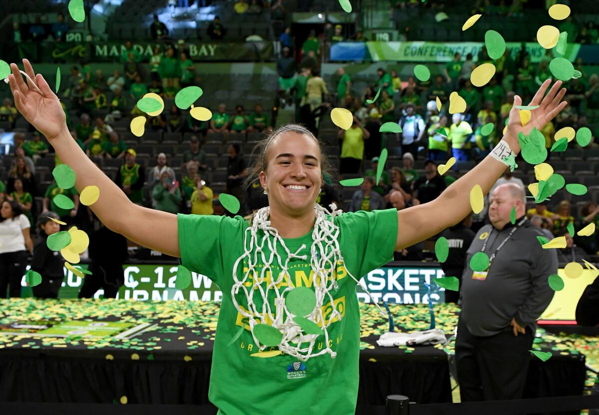 Oregon guard Sabrina Ionescu celebrates the Ducks' win over Stanford in the Pac-12 tournament title game.