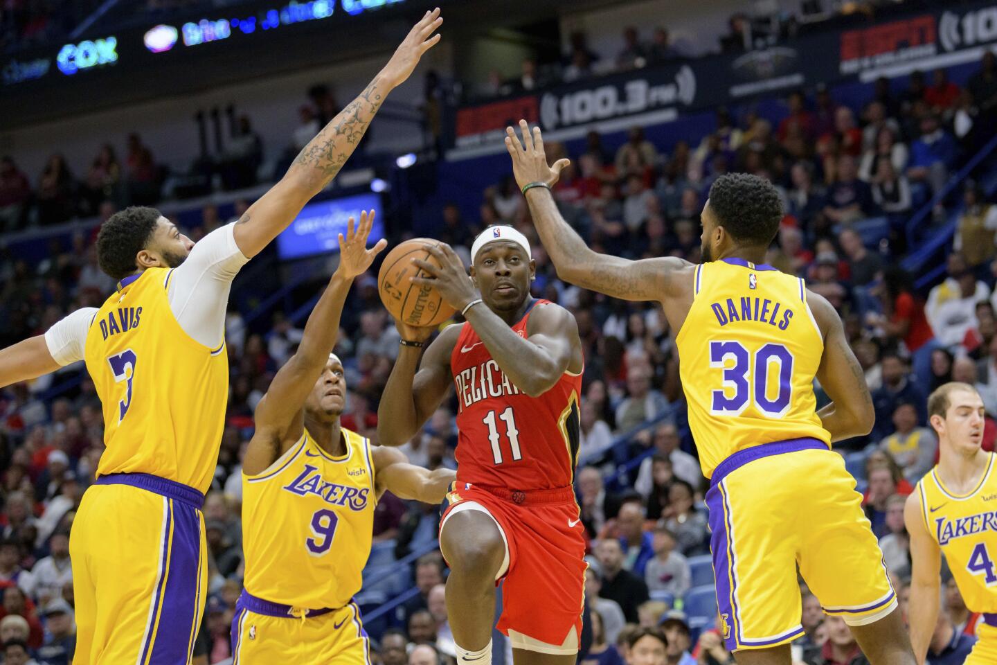Pelicans guard Jrue Holiday (11) looks to shoot during a game against the Lakers on Nov. 27.