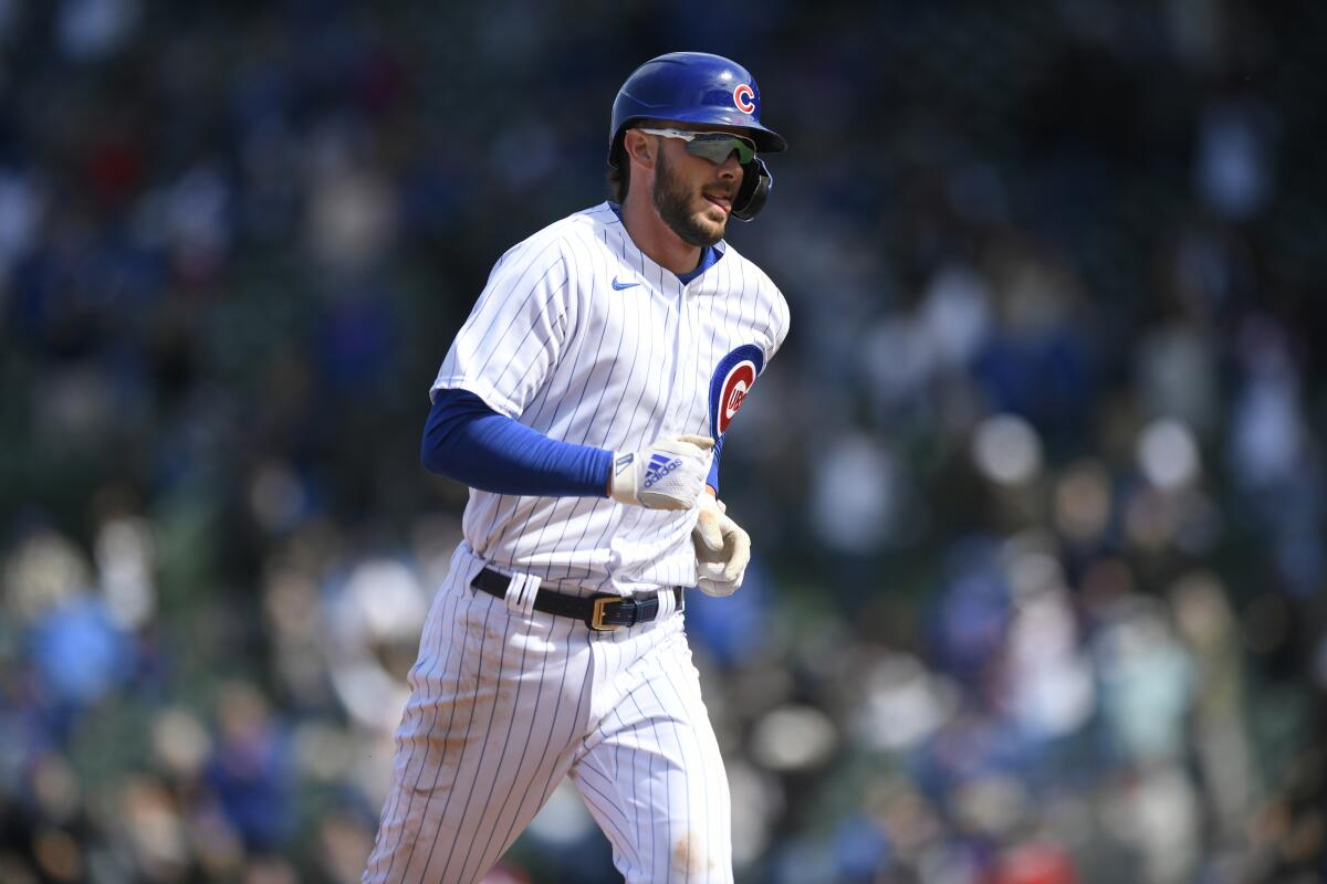 Bryant, Contreras lead Cubs over Braves in Kazmar's return - The