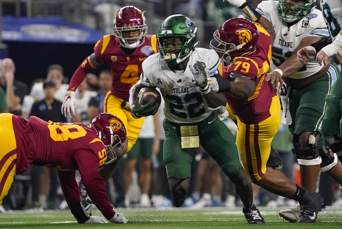 Tulane running back Tyjae Spears runs with the ball during the second half of the Cotton Bowl against USC.