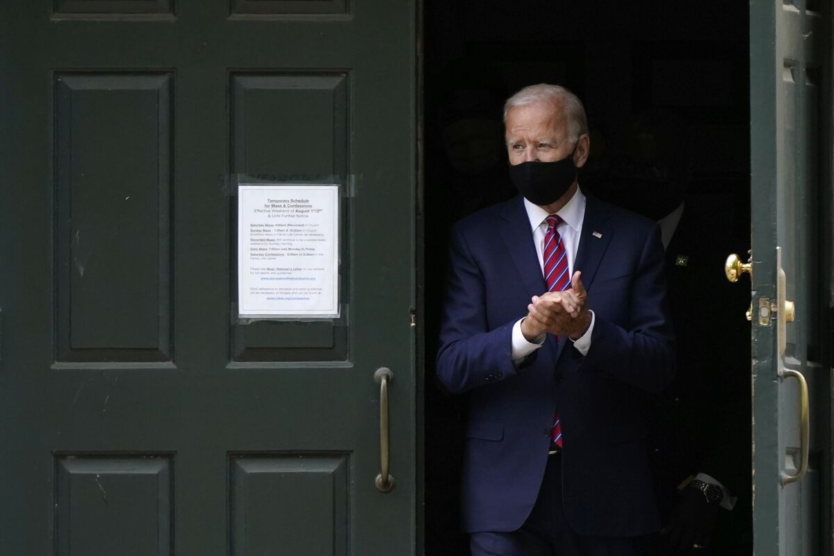 Then-presidential candidate Joe Biden leaves a church in Wilmington, Del.