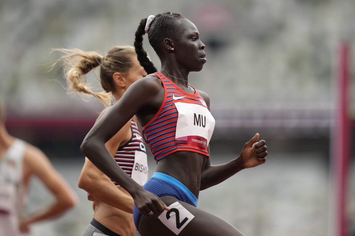 Athing Mu wins a heat in the women's 800 meters at the Tokyo Olympics on Friday.