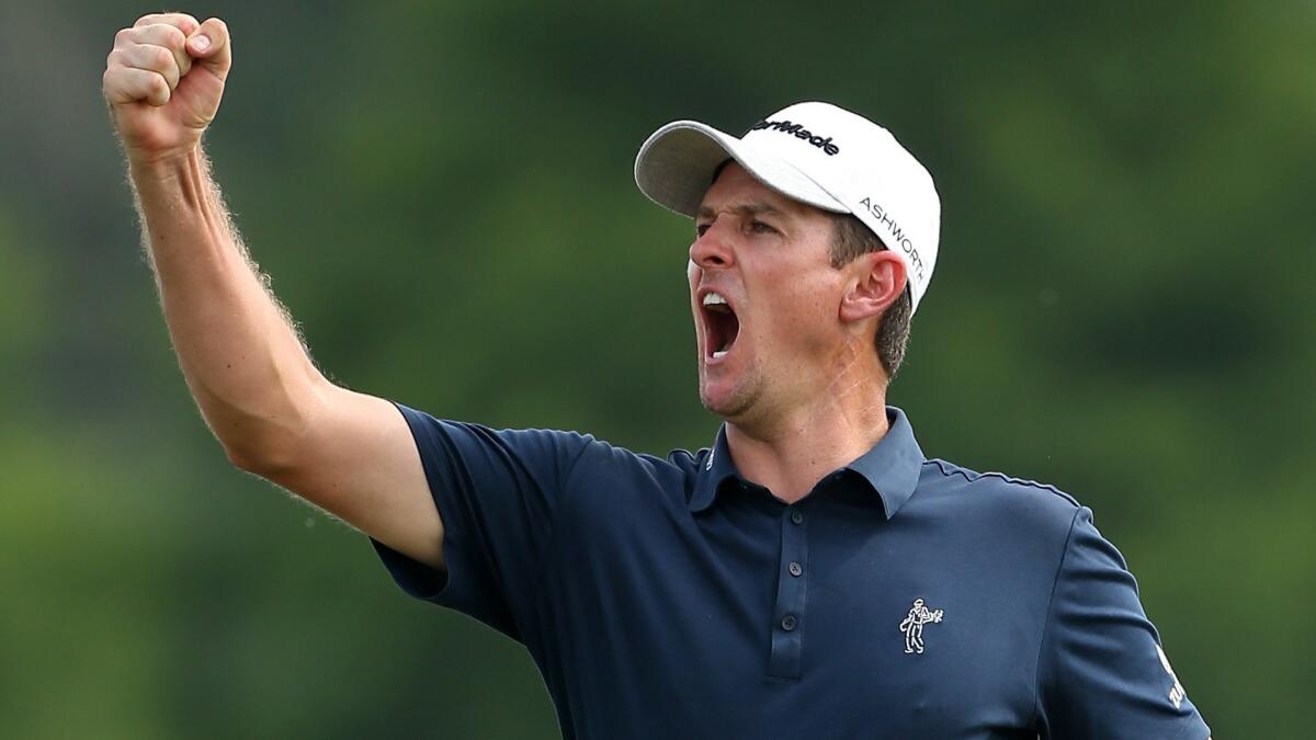 Justin Rose celebrates his birdie putt on the 18th hole during the final round of his victory at the Zurich Classic in New Orleans on April 26.