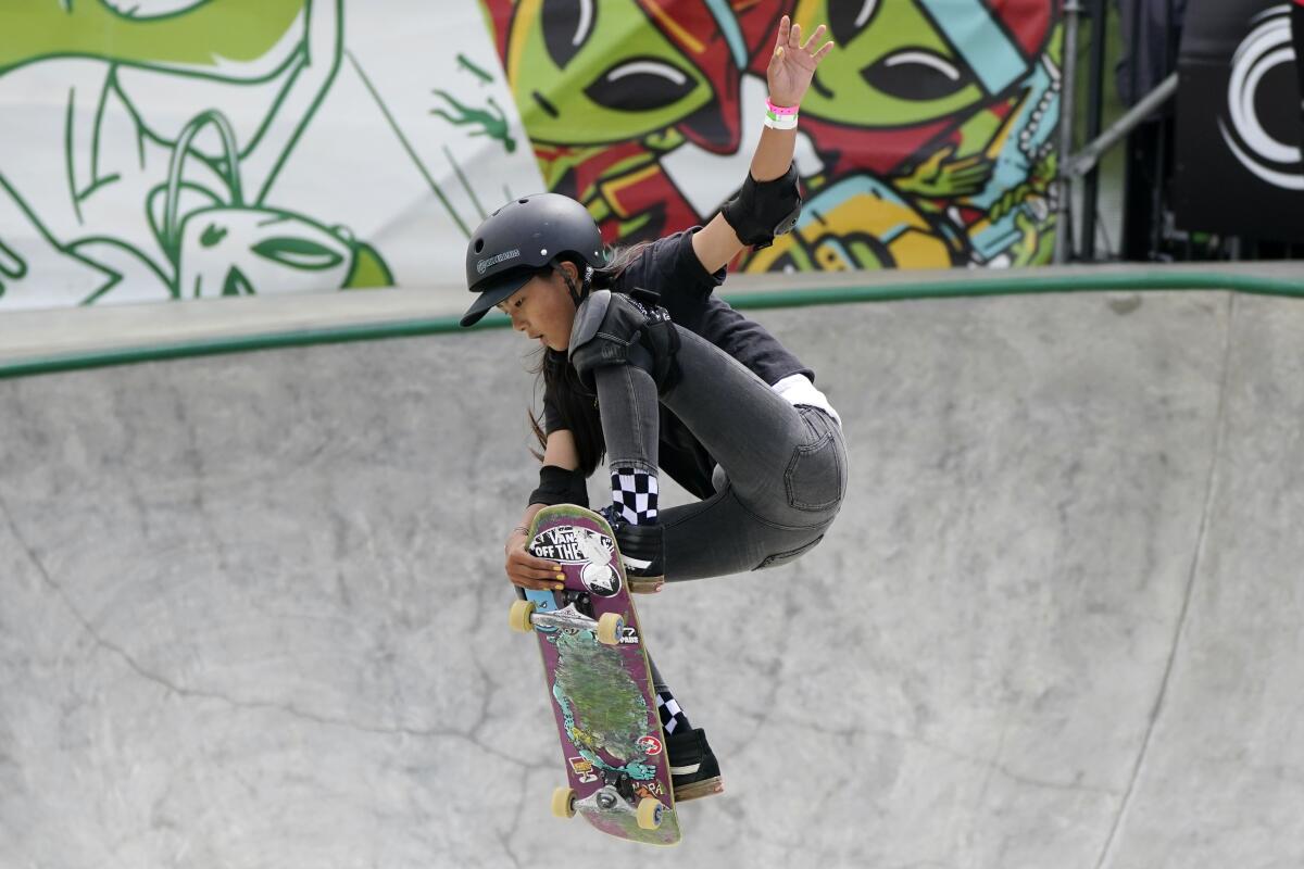 FILE - In this Sunday, May 23, 2021 file photo, Kokona Hiraki, of Japan, competes in the women's Park Final during an Olympic qualifying skateboard event at Lauridsen Skatepark in Des Moines, Iowa. Skateboarding is one of four debut sports at the Tokyo Games, along with karate, surfing and sport climbing. (AP Photo/Charlie Neibergall, File)