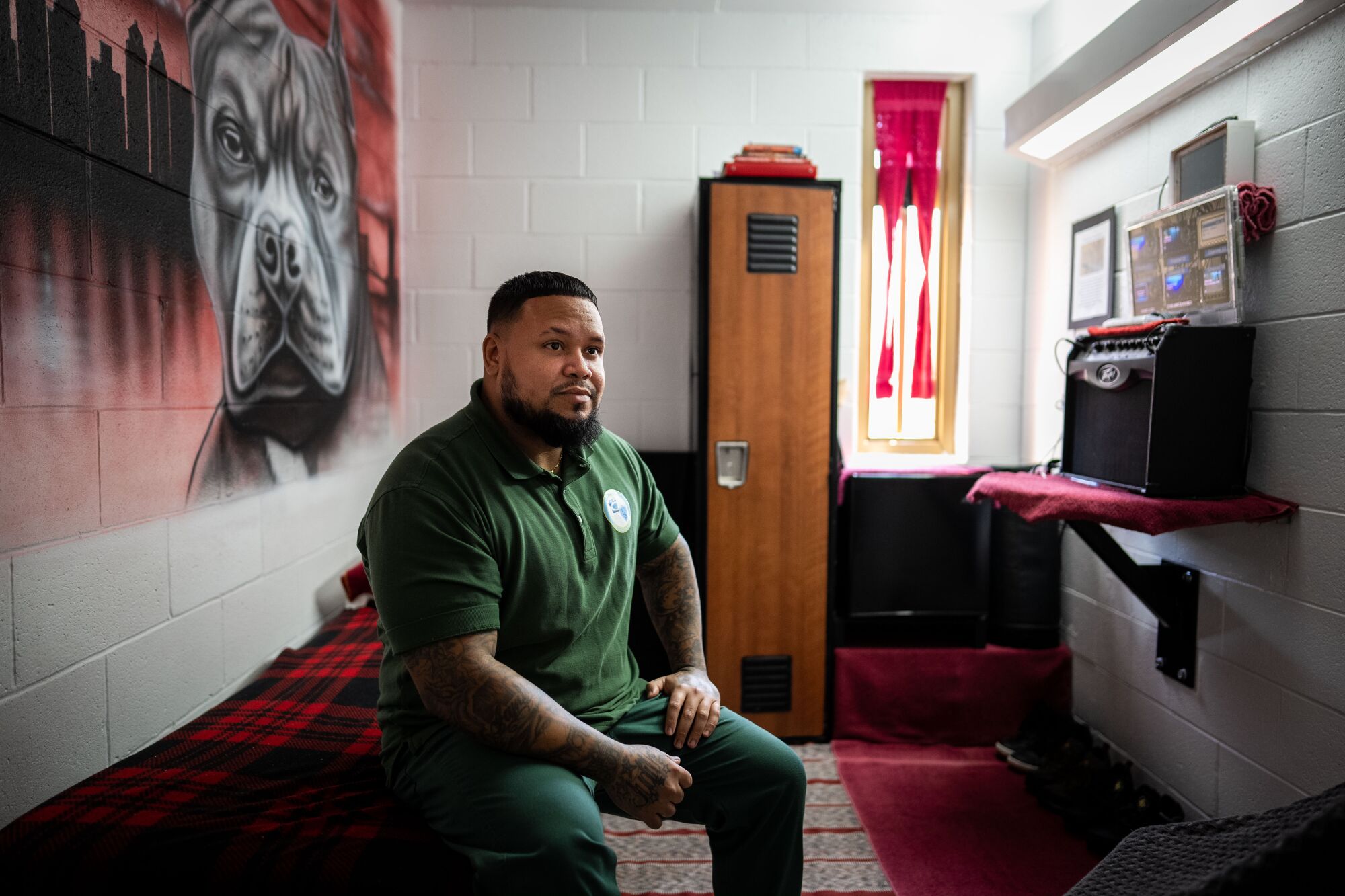 Luis sits in his colorful cell in the "Little Scandinavia" unit at the Pennsylvania State Correctional Institution.