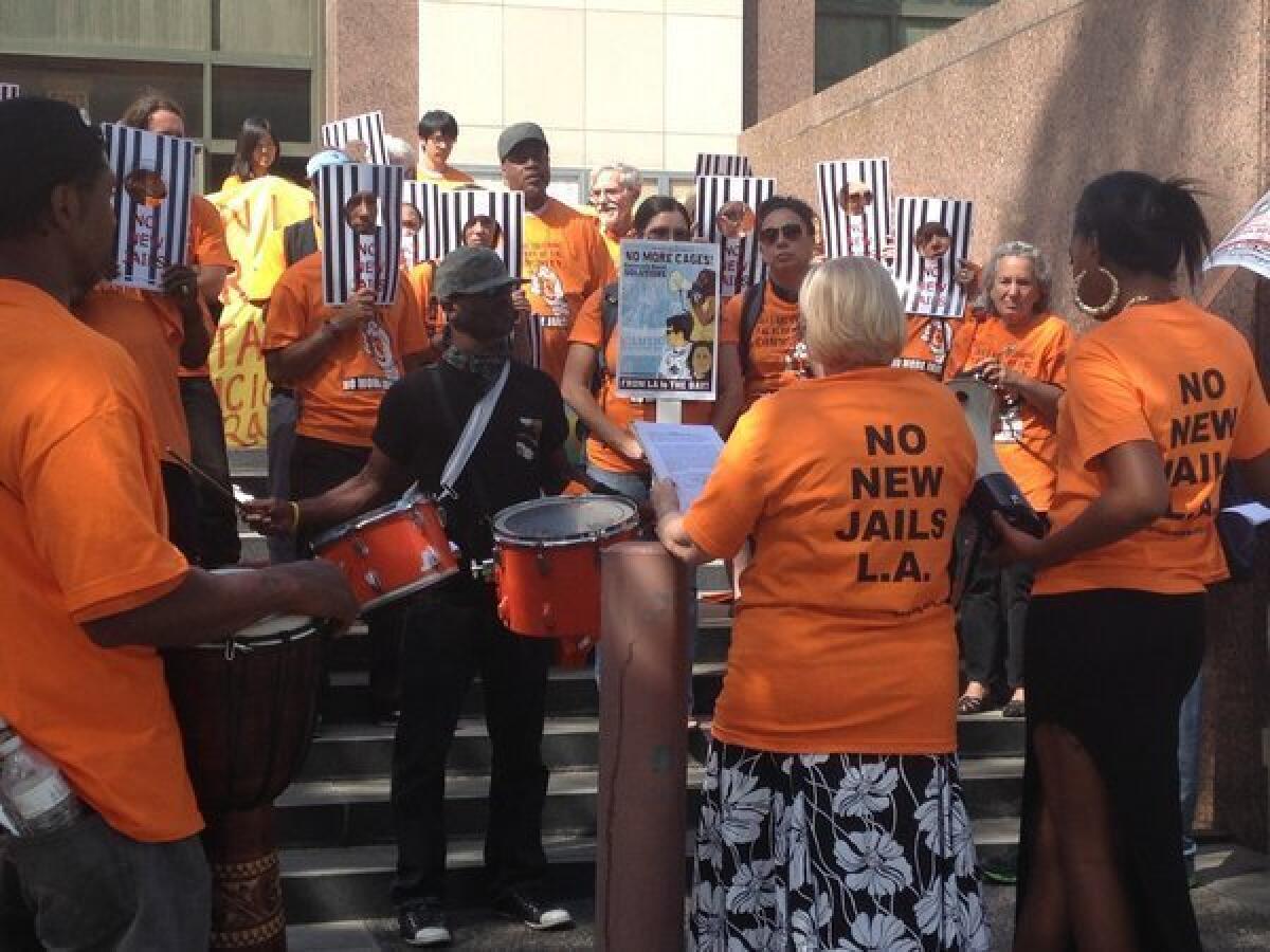 Protesters gather outside the L.A. County Hall of Administration as the Board of Supervisors considered plans to renovate several crowded jails.