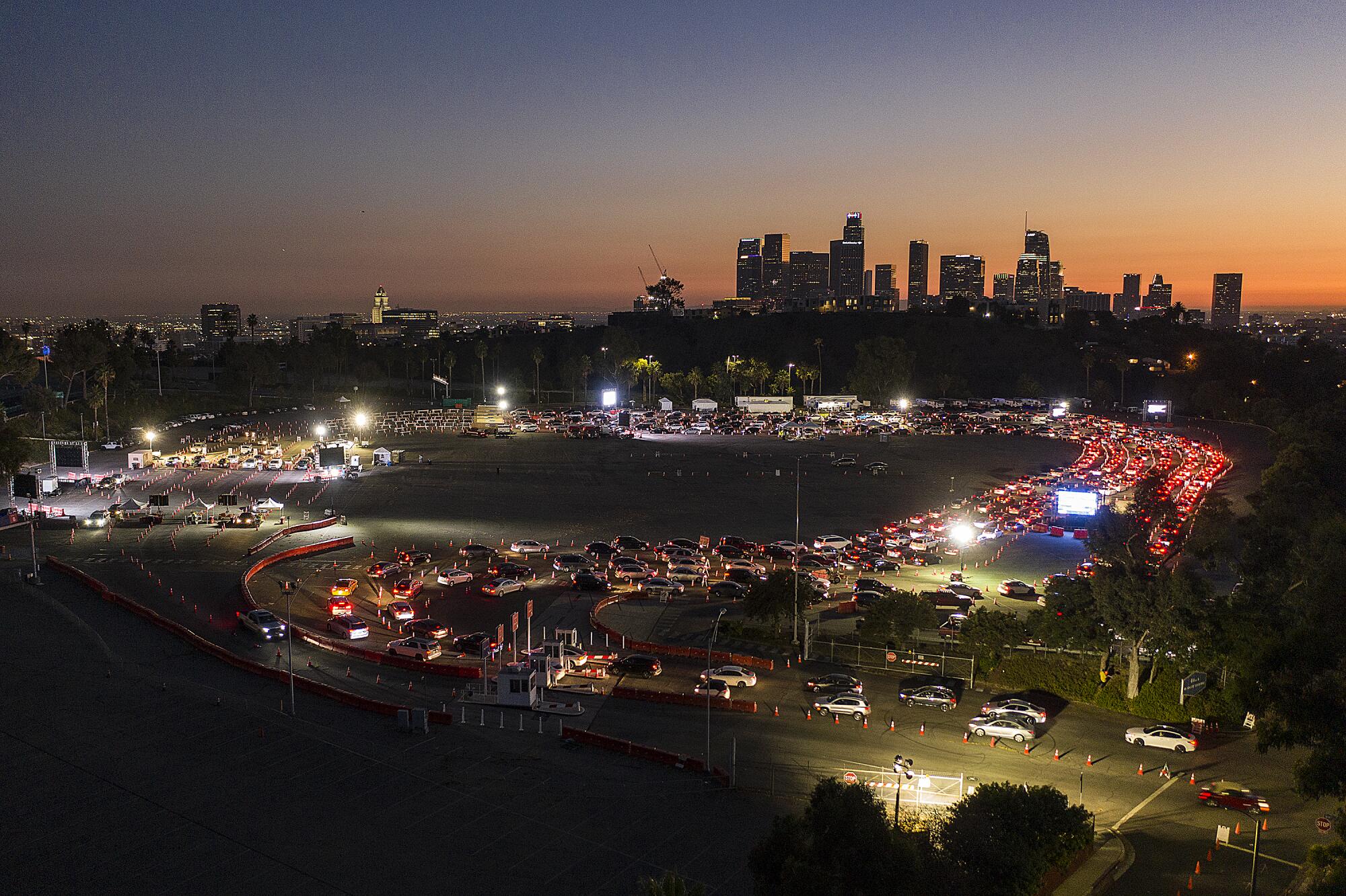 Los Angeles: Cars line up in the evening for coronavirus testing at Dodger Stadium.